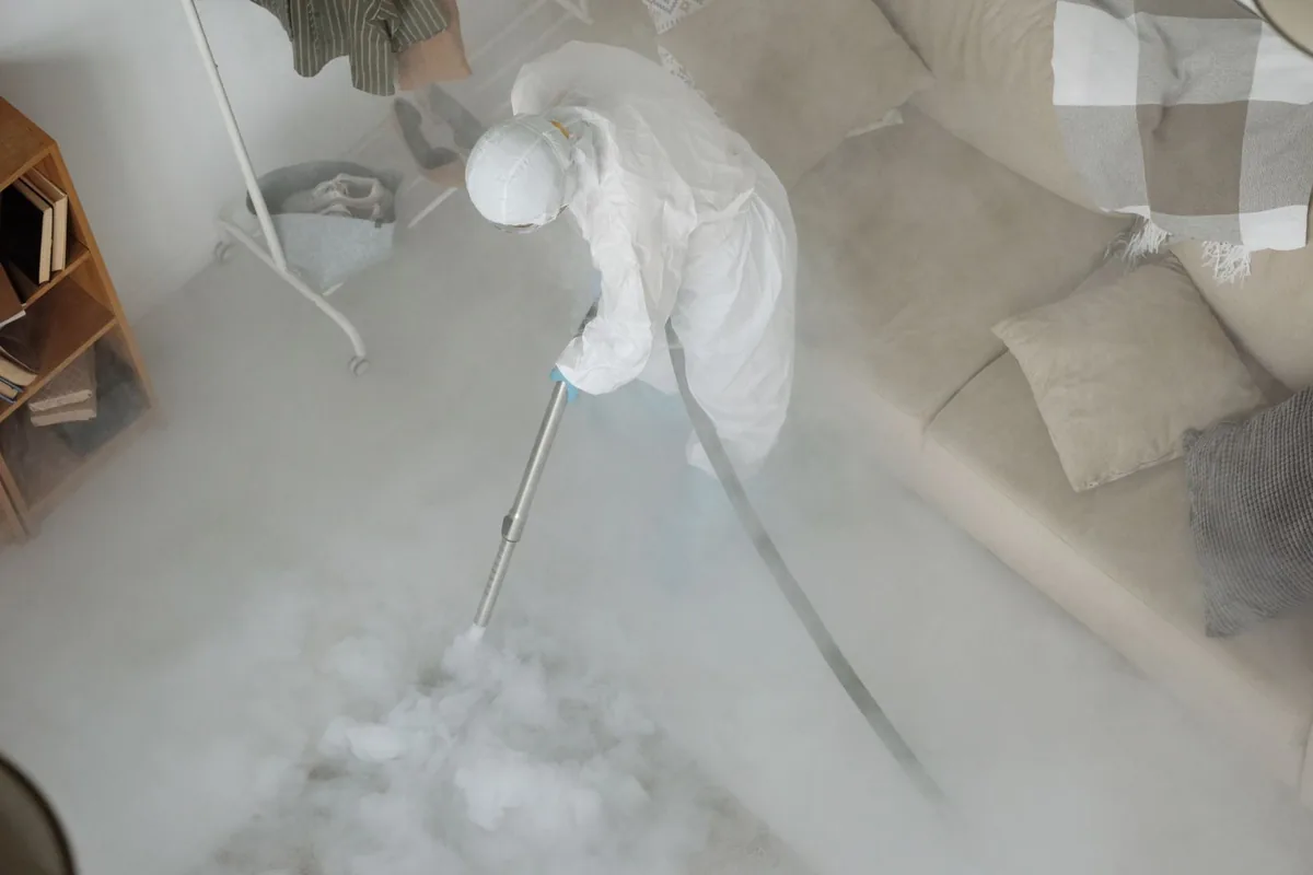 Biohazard cleanup technician in protective equipment, Pine Grove, PA